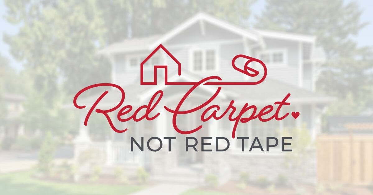 Red Carpet Logo in front of a nice suburban home
